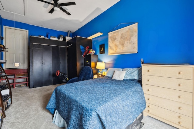 bedroom featuring carpet floors, ceiling fan, and a closet