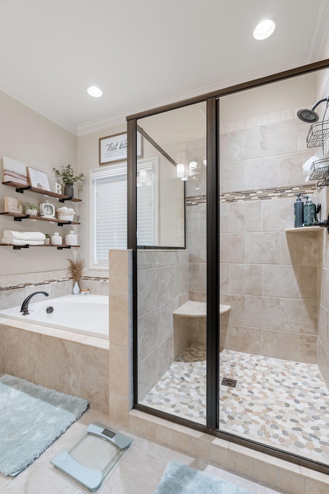 bathroom with tile patterned floors, ornamental molding, and separate shower and tub