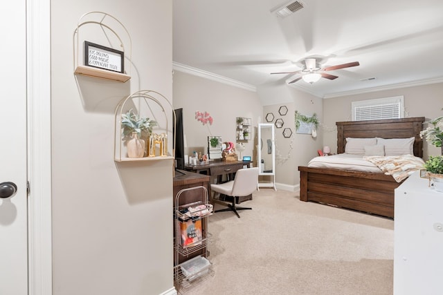 bedroom featuring ornamental molding, carpet floors, and ceiling fan