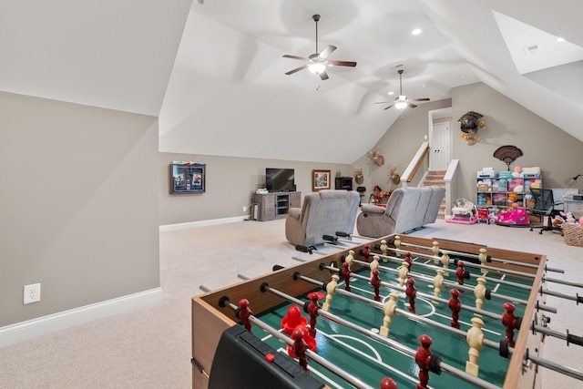 game room with vaulted ceiling, carpet floors, and ceiling fan