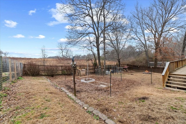 view of yard with a wooden deck