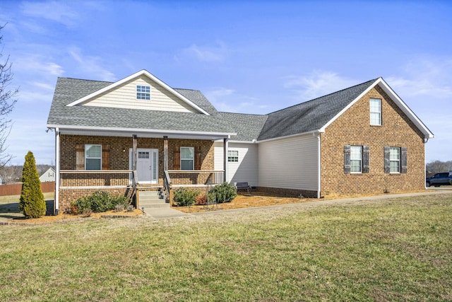 view of front of property featuring a porch and a front lawn