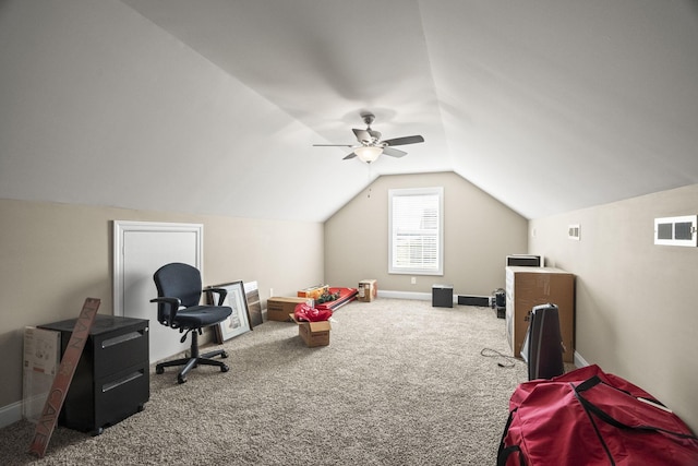 interior space featuring carpet floors, ceiling fan, and vaulted ceiling