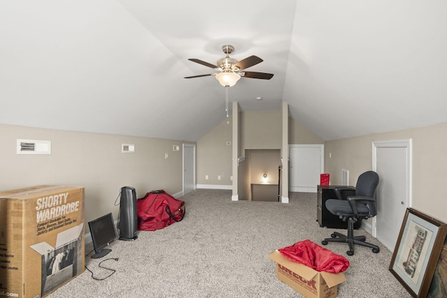 carpeted office space with ceiling fan and lofted ceiling