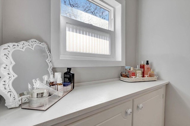 bar featuring white cabinetry