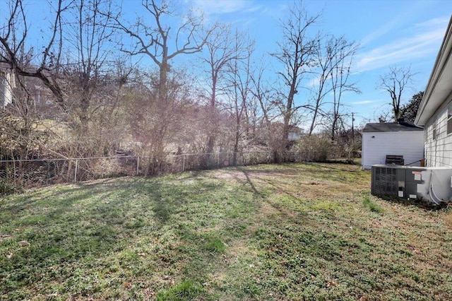 view of yard with central AC unit