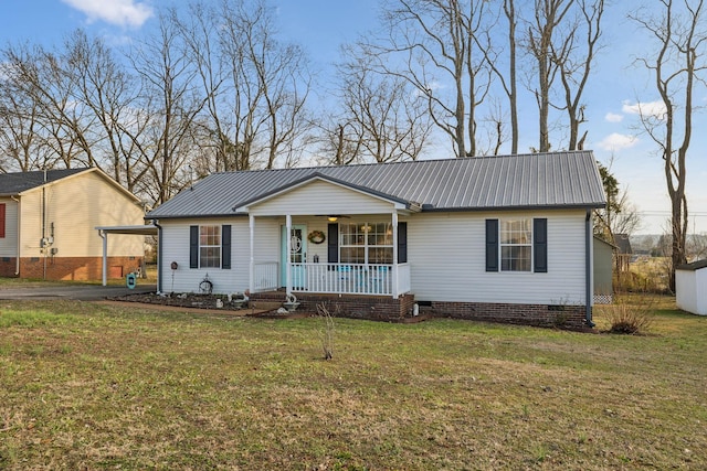 ranch-style home with a carport, covered porch, and a front lawn