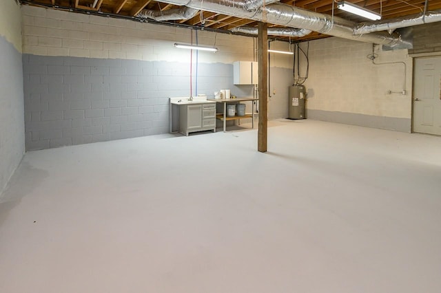 basement with sink and water heater