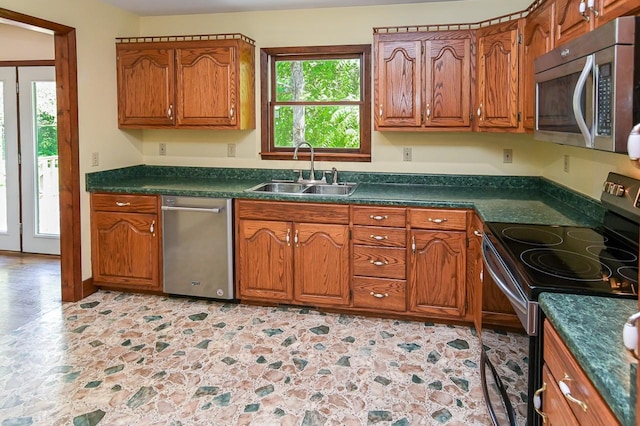 kitchen with appliances with stainless steel finishes and sink