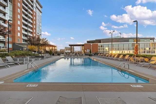 view of swimming pool featuring a patio