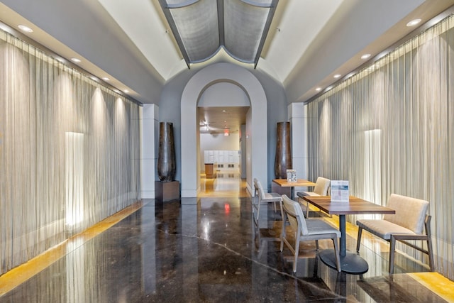 dining area with lofted ceiling