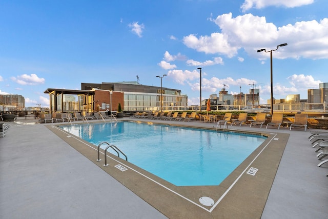 view of pool featuring a patio