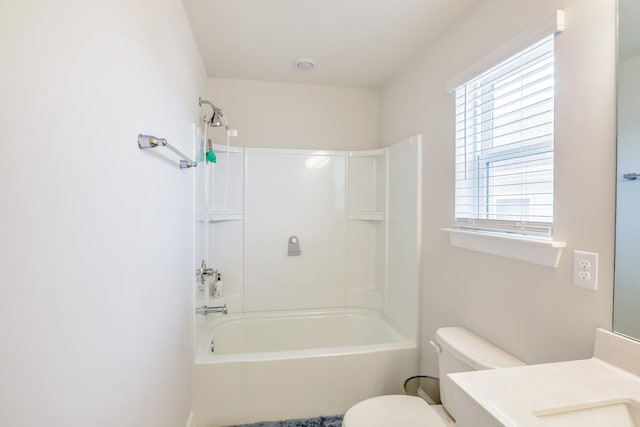 full bathroom featuring shower / tub combination, vanity, and toilet