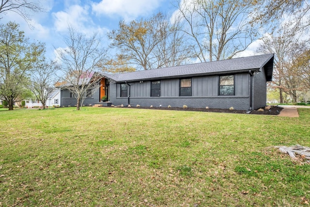 ranch-style house with a front lawn