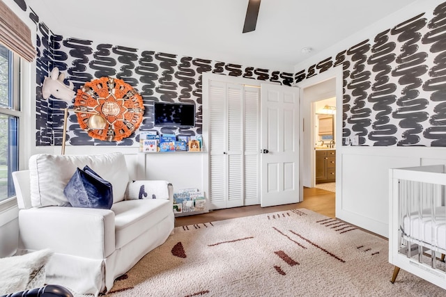 bedroom with hardwood / wood-style flooring and ceiling fan