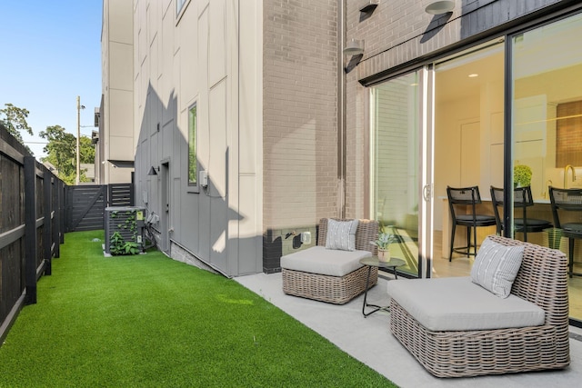 exterior space with central AC and ceiling fan