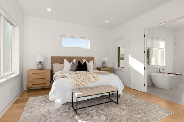 bedroom featuring light hardwood / wood-style floors