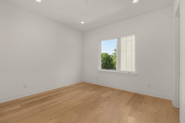 unfurnished room featuring light wood-type flooring