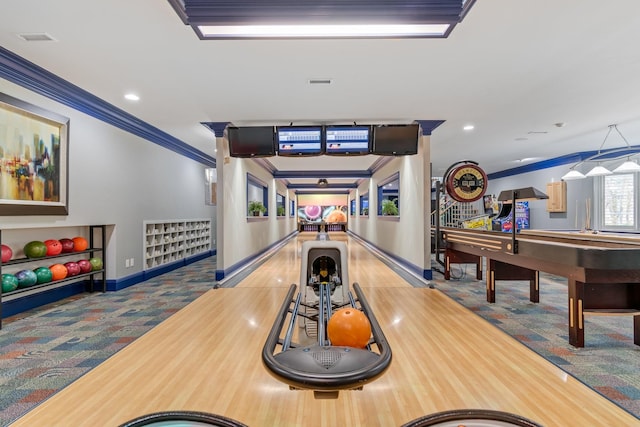 playroom featuring ornamental molding, carpet, and bowling