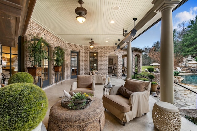 view of patio with ceiling fan