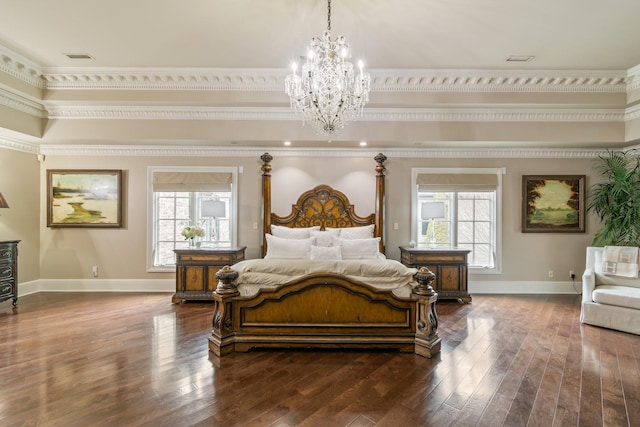 bedroom with multiple windows, crown molding, dark hardwood / wood-style floors, and an inviting chandelier