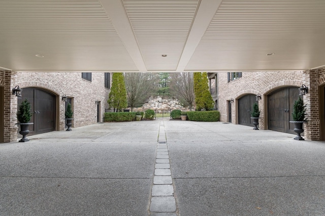 view of patio featuring a garage