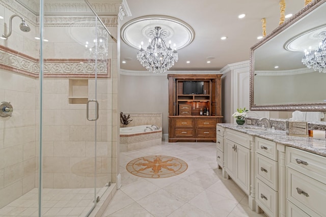 bathroom with vanity, a notable chandelier, and crown molding