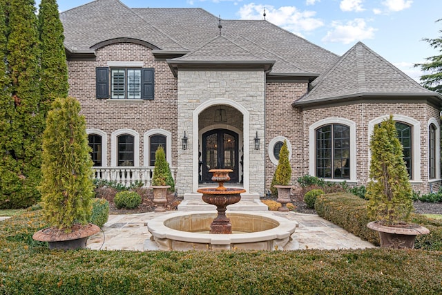 french country style house featuring french doors