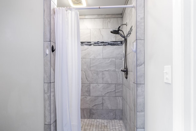 bathroom featuring walk in shower