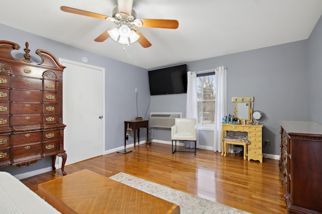 bedroom featuring ceiling fan and wood-type flooring