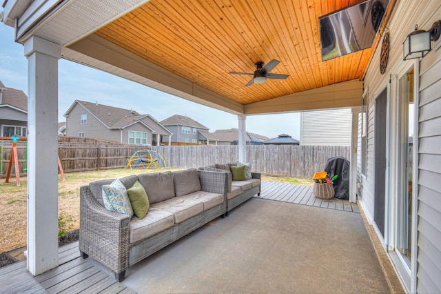 view of patio / terrace featuring ceiling fan, outdoor lounge area, and a playground