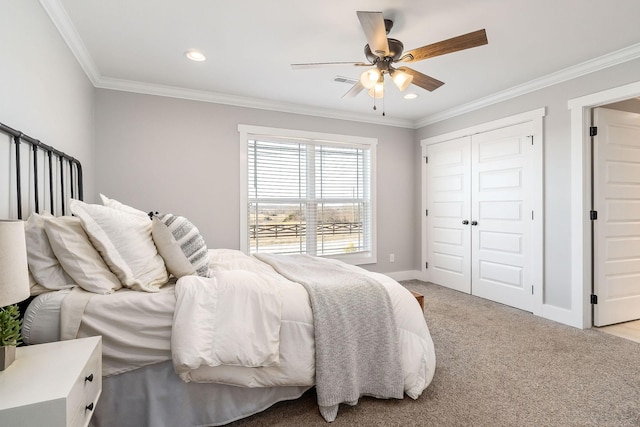 carpeted bedroom with crown molding, a closet, and ceiling fan