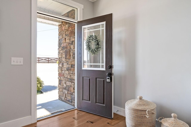 foyer entrance featuring hardwood / wood-style flooring