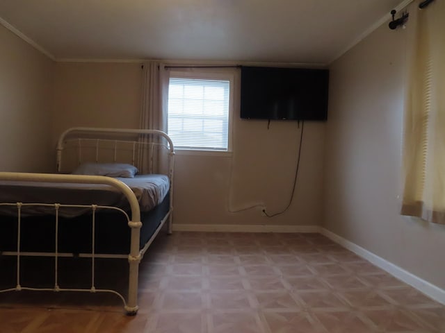 unfurnished bedroom featuring parquet flooring and ornamental molding