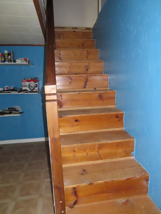 staircase with parquet floors