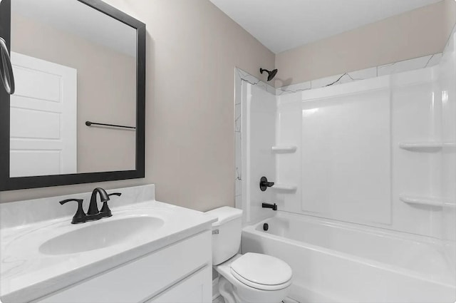 full bathroom featuring vanity, tub / shower combination, and toilet