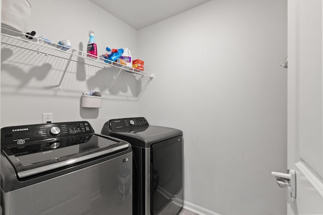 washroom featuring independent washer and dryer