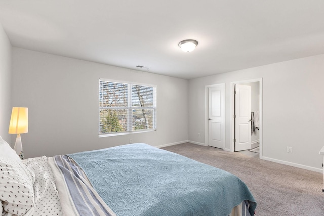 bedroom with light carpet