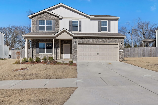 craftsman-style home with a garage and covered porch