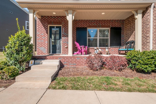 doorway to property featuring a porch