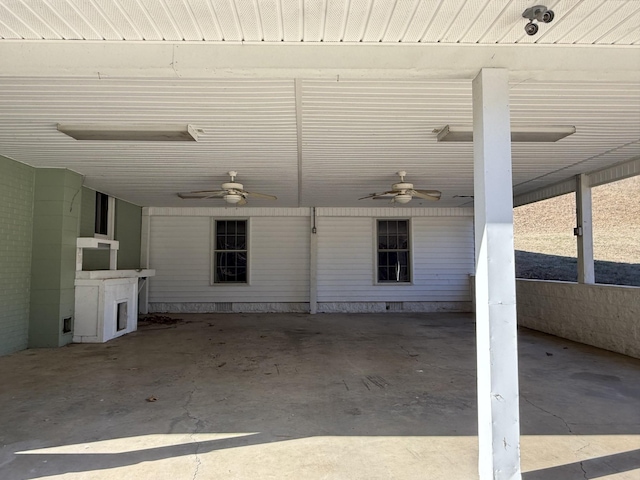 view of patio featuring ceiling fan