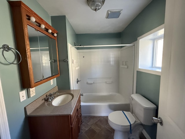 full bathroom with vanity, shower / tub combination, and toilet