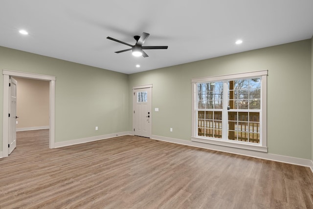 interior space with ceiling fan and light wood-type flooring