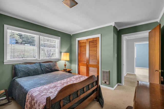 bedroom with crown molding, heating unit, light colored carpet, and a closet