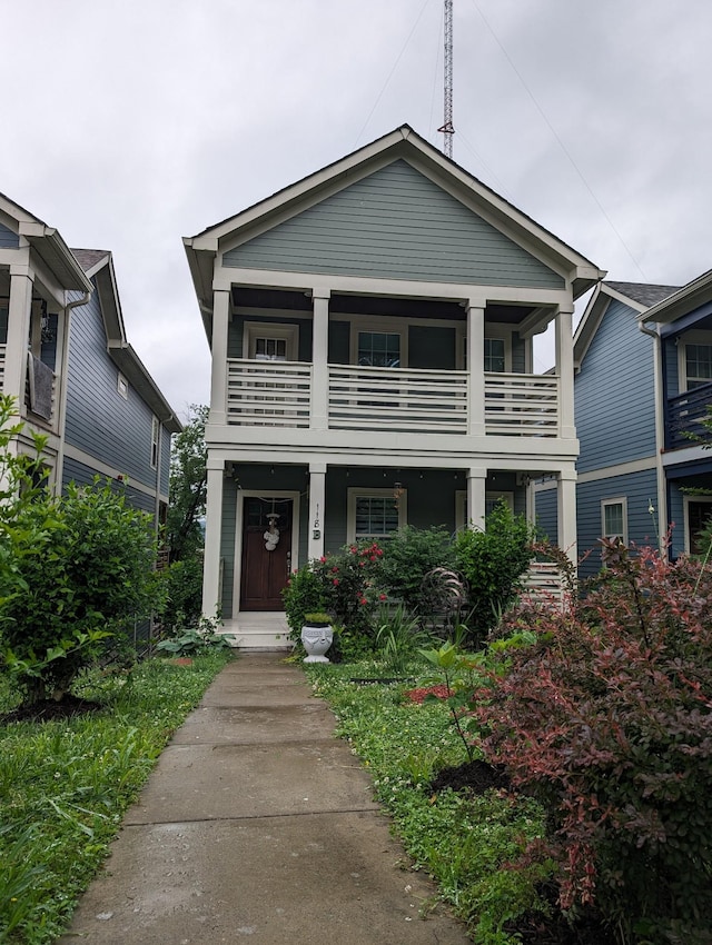 view of front of property with a balcony