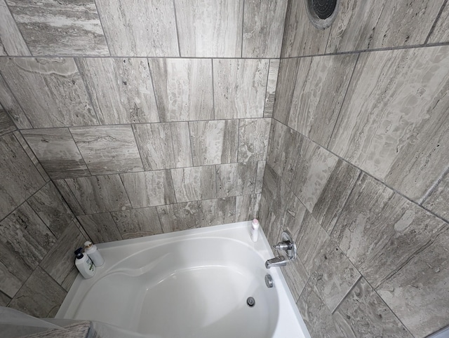 bathroom featuring bathing tub / shower combination