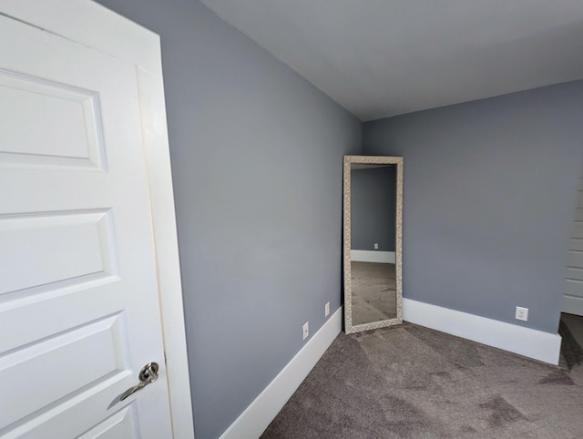 empty room featuring carpet flooring