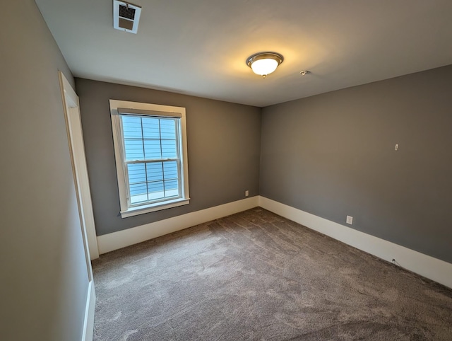 unfurnished room with carpet