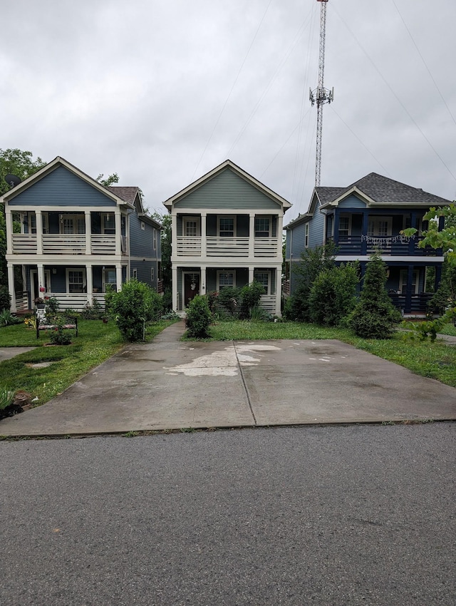 view of front of house with a balcony