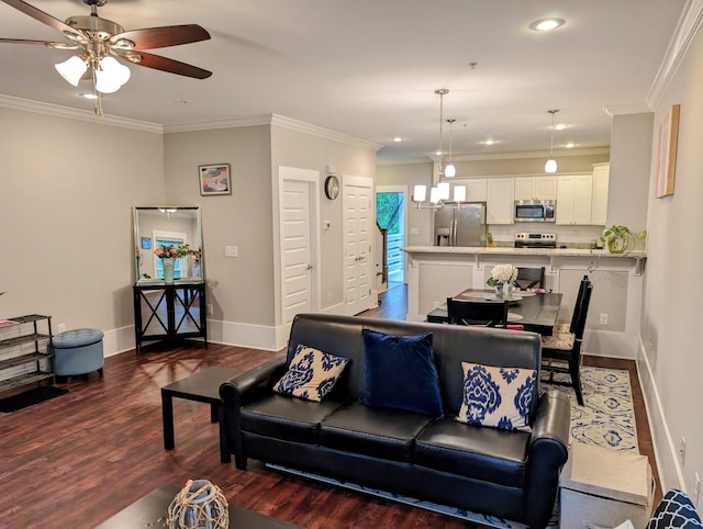 living room featuring crown molding, dark hardwood / wood-style floors, and ceiling fan